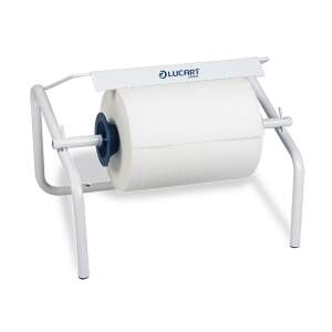 Free-standing paper towel roll dispenser with a large white roll ready to dispense, on a metal frame with a serrated edge.